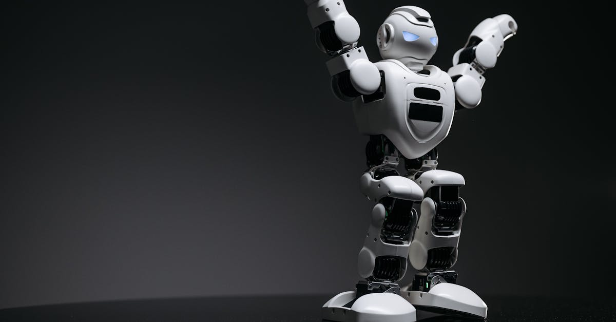 An industrial humanoid robot working on a production line in a modern factory
