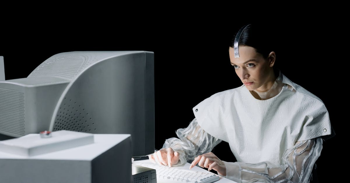 An office worker interacting with an autonomous AI agent interface on their computer in 2026